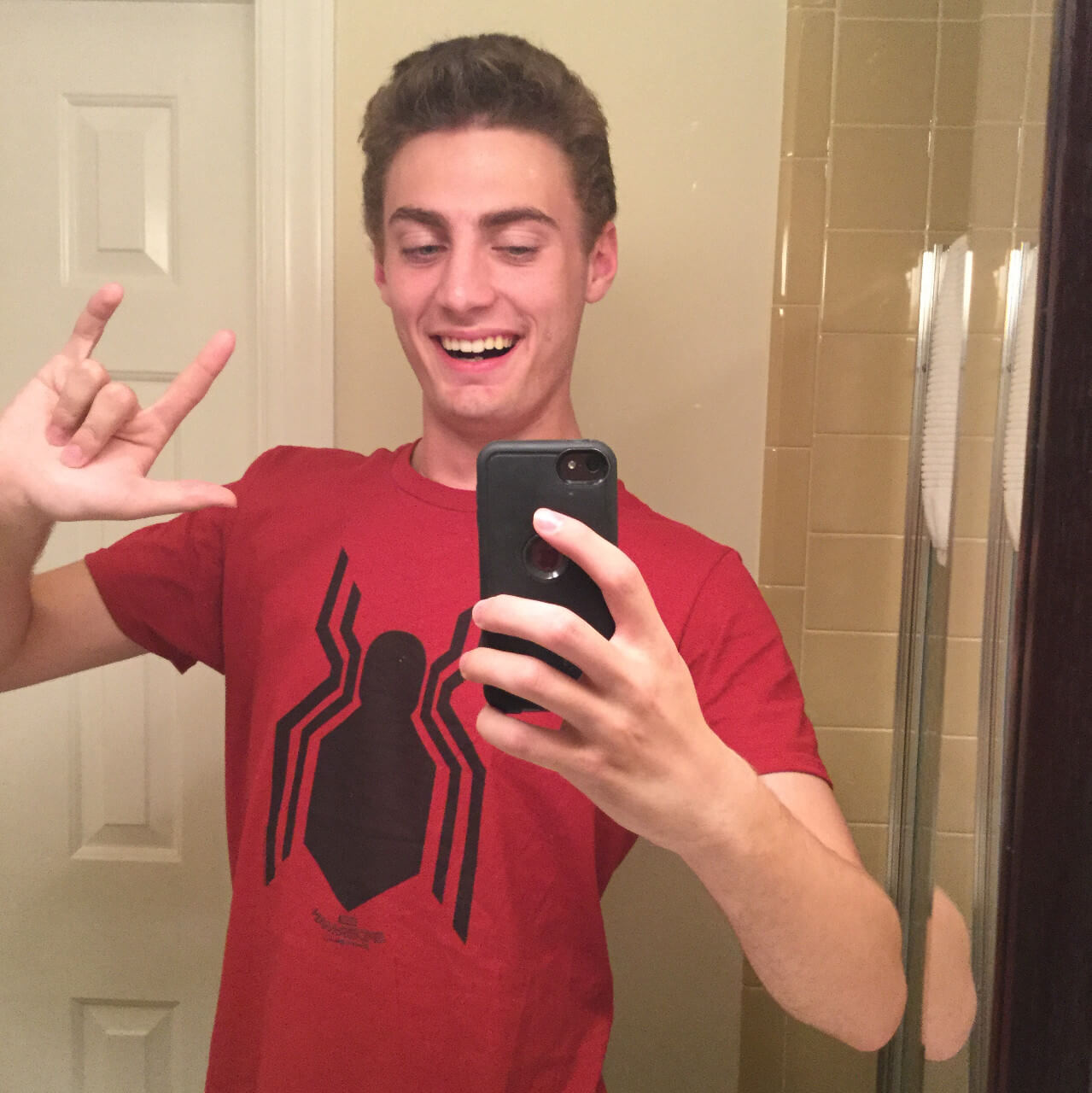 Bean wearing a Spiderman shirt